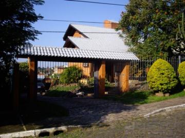 Casa com 5 dormitórios e piscina no bairro Padre Réus em São Leopoldo.