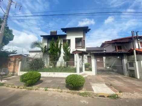 Casa residencial com 3 dormitórios e piscina localizada no Bairro Scharlau