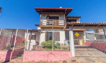 Linda casa semi mobiliada com 4 dormitórios localizada no Bairro Cristo Rei