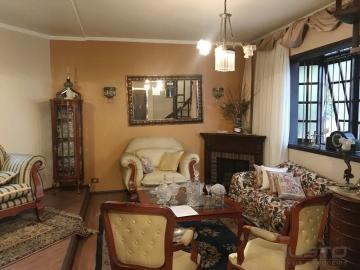 Casa com 3 dormitórios, sacada e piscina à venda no Bairro Morro do Espelho em São Leopoldo