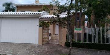 Casa com 4 dormitórios e piscina à venda no Bairro Morro do Espelho em São Leopoldo