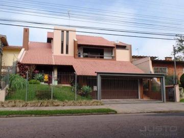 Casa com 5 dormitórios e piscina à venda no Bairro Padre Réus em São Leopoldo.