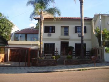 Casa com 3 dormitórios e piscina à venda no Bairro Jardim América em São Leopoldo