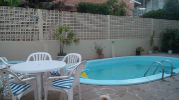 Casa com 3 dormitórios e piscina à venda no Bairro Jardim América em São Leopoldo