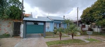 Linda casa residencial, localizada no bairro Independência em São Leopoldo, com 3 dormitórios, pátio e piscina!