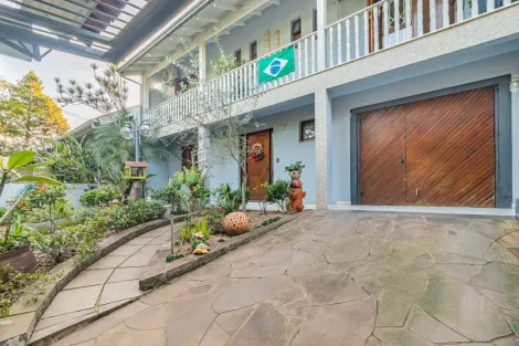 imagem 3 - Casa de 4 dormitórios, sendo 1 suíte, e 3 vagas de garagens, no Jardim América imagem 3 - Casa de 4 dormitórios, sendo 1 suíte, e 3 vagas de garagens, no Jardim América