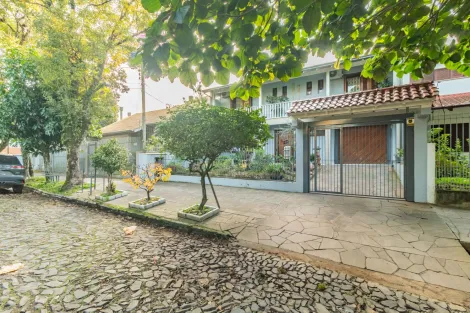 imagem 2 - Casa de 4 dormitórios, sendo 1 suíte, e 3 vagas de garagens, no Jardim América imagem 2 - Casa de 4 dormitórios, sendo 1 suíte, e 3 vagas de garagens, no Jardim América