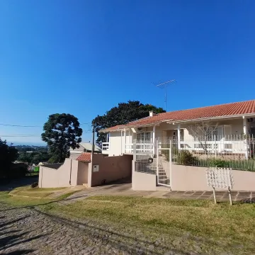 Casa com 3 dormitórios, home office, salão de festas e piscina localizada no Jardim América